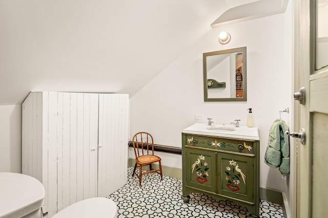 681 Sedgwick Ridge Rd, Sedgwick, ME 04676 - bathroom with vanity and vaulted ceiling