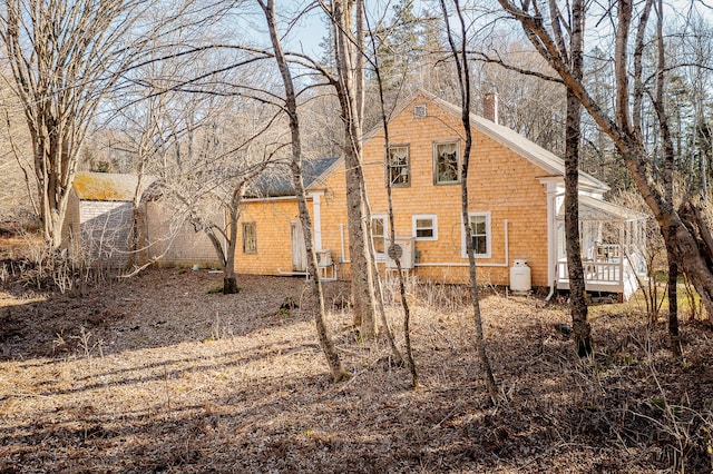 681 Sedgwick Ridge Rd, Sedgwick, ME 04676 - back of house with a chimney