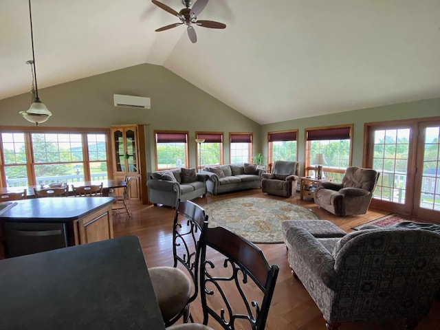 living room featuring high vaulted ceiling, an AC wall unit, ceiling fan, and dark wood-type flooring