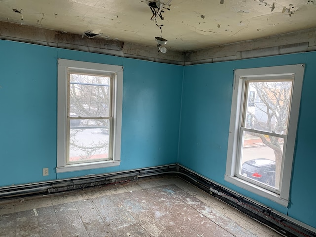 unfurnished room with a wealth of natural light