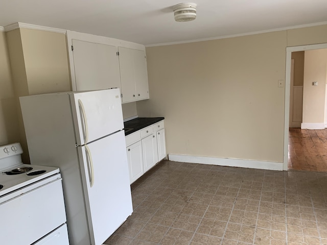 kitchen featuring wood-type flooring, white appliances, white cabinetry, and crown molding