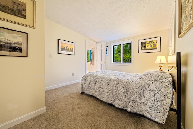 15 Brentwood Dr Unit 4, Cumberland, ME 04110 - bedroom with carpet, a textured ceiling, vaulted ceiling, and baseboards