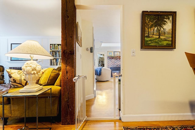 15 Brentwood Dr Unit 4, Cumberland, ME 04110 - hall with baseboards and wood finished floors