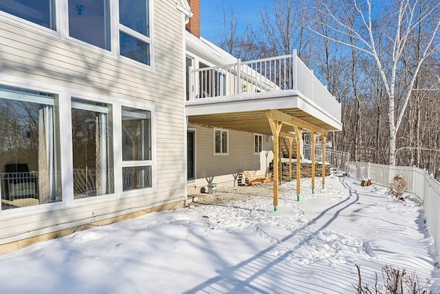 view of snow covered property