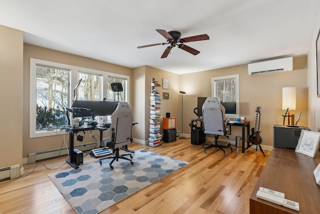 office space featuring ceiling fan, wood-type flooring, a baseboard radiator, and a wall unit AC