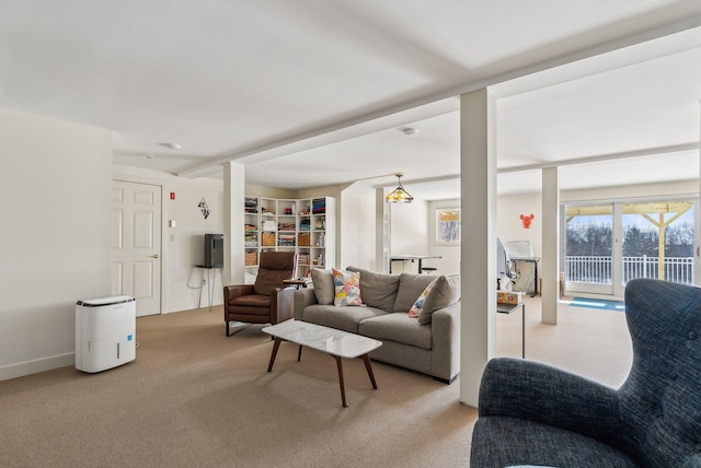 living room featuring light carpet