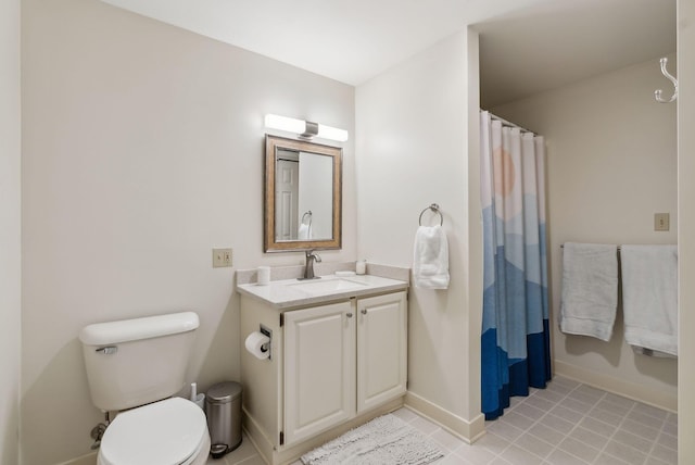 bathroom with vanity, toilet, and a shower with shower curtain