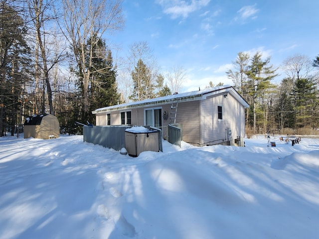 view of snow covered house