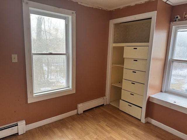 closet with baseboard heating