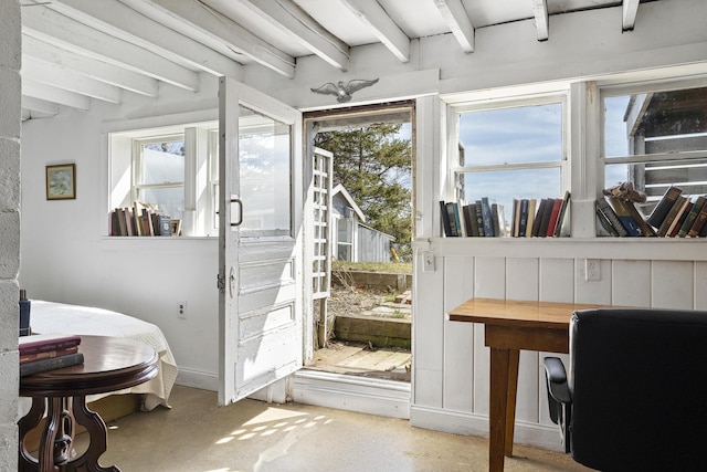 283 Mills Rd, Newcastle, ME 04553 - entryway featuring concrete floors, beam ceiling, and baseboards
