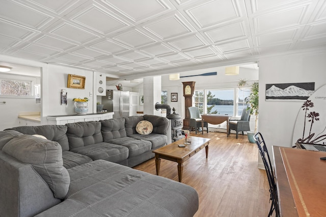 283 Mills Rd, Newcastle, ME 04553 - living room featuring an ornate ceiling, light wood finished floors, and a water view