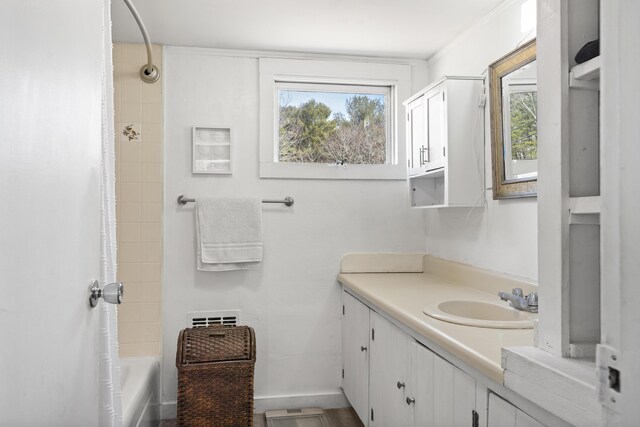 283 Mills Rd, Newcastle, ME 04553 - full bathroom with shower / bathtub combination with curtain, vanity, and baseboards