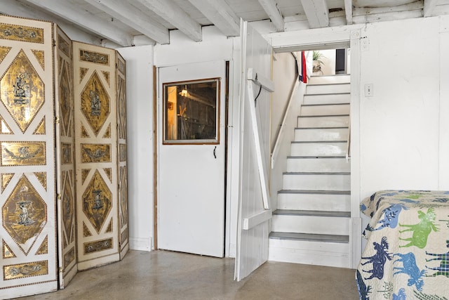 283 Mills Rd, Newcastle, ME 04553 - stairs with concrete floors and beamed ceiling