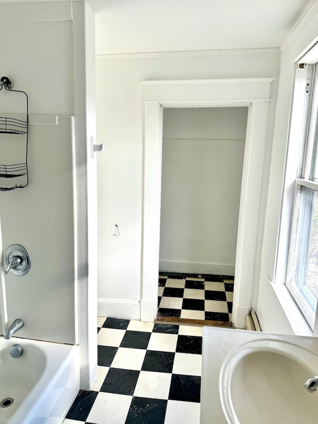 bathroom with vanity, a baseboard radiator, and tub / shower combination