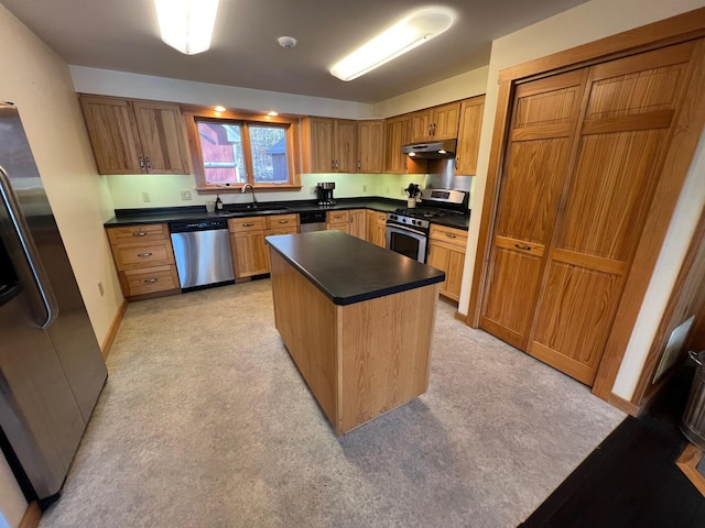 kitchen with sink, a center island, light colored carpet, and appliances with stainless steel finishes