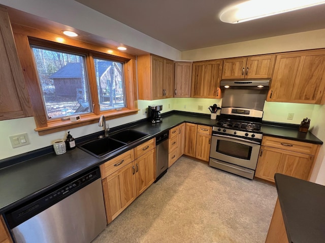 kitchen with sink and appliances with stainless steel finishes