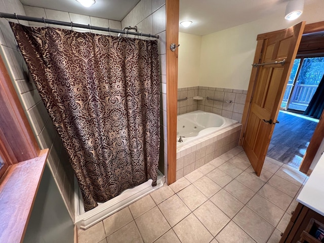 bathroom featuring tile patterned flooring and shower with separate bathtub