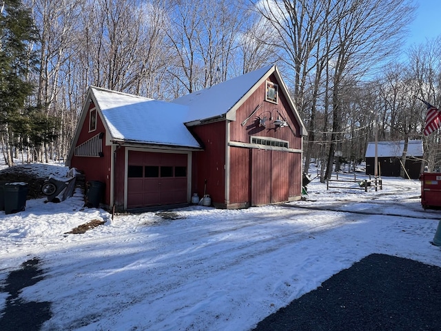 view of snow covered garage