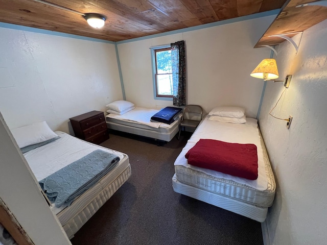 bedroom featuring wood ceiling