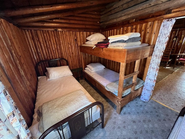 bedroom featuring carpet floors and vaulted ceiling