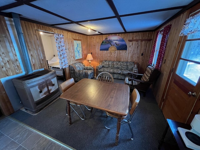 dining space with wooden walls