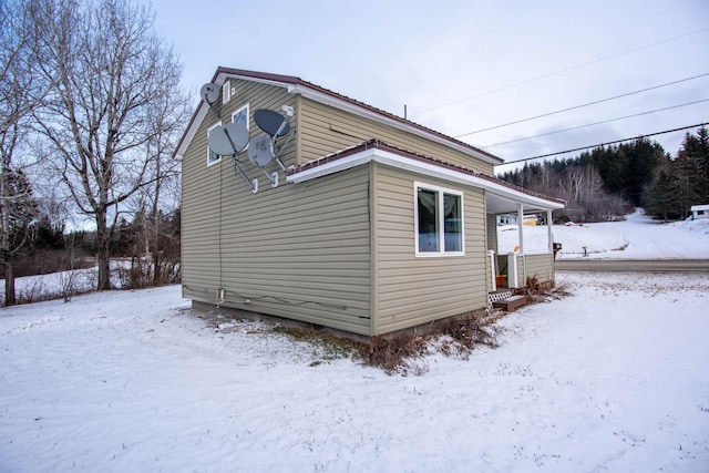 view of snow covered property