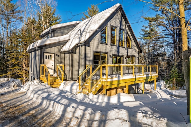 view of front of property with entry steps and board and batten siding