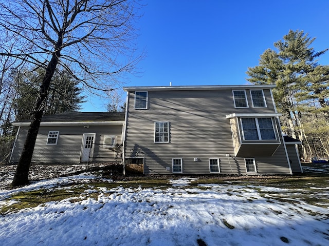 view of snow covered house