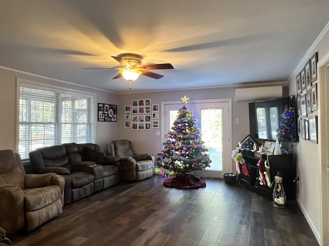 701 Stetson Rd, Exeter, ME 04435 - living area featuring dark wood finished floors, crown molding, ceiling fan, and an AC wall unit