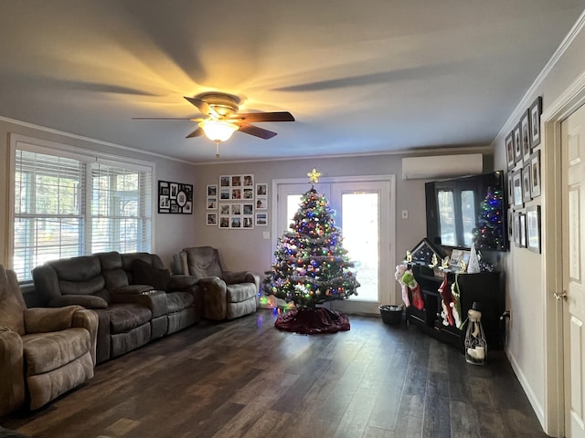701 Stetson Rd, Exeter, ME 04435 - living room featuring plenty of natural light, dark wood-style floors, ornamental molding, a ceiling fan, and an AC wall unit