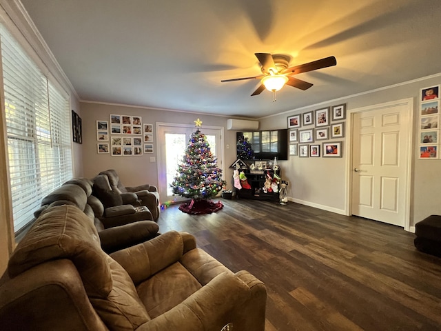 701 Stetson Rd, Exeter, ME 04435 - living room featuring a ceiling fan, dark wood-style flooring, an AC wall unit, and ornamental molding