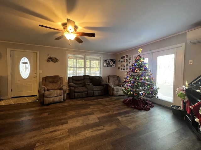 living room featuring a wall mounted AC, ceiling fan, dark hardwood / wood-style flooring, and ornamental molding