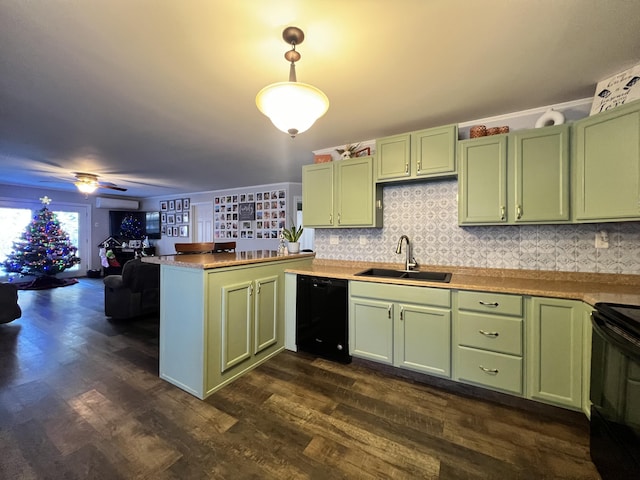 701 Stetson Rd, Exeter, ME 04435 - kitchen with green cabinets, black appliances, and a peninsula