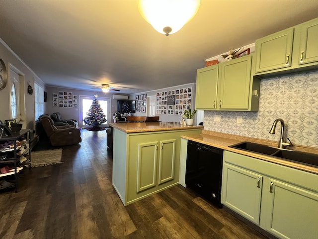 701 Stetson Rd, Exeter, ME 04435 - kitchen featuring dishwasher, green cabinets, a peninsula, and ornamental molding