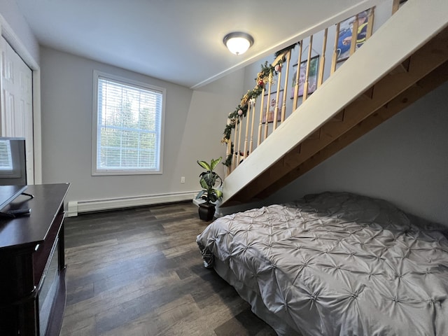 701 Stetson Rd, Exeter, ME 04435 - bedroom with baseboard heating and wood finished floors