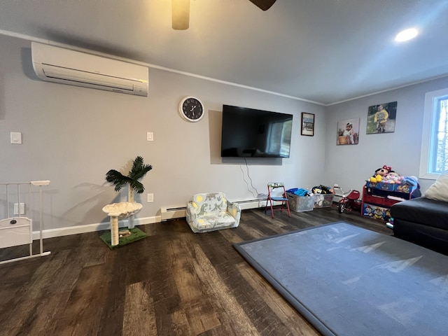 701 Stetson Rd, Exeter, ME 04435 - living area featuring an AC wall unit, wood finished floors, a ceiling fan, and a baseboard heating unit