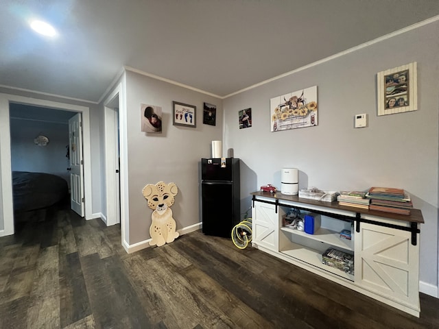 interior space with crown molding and dark wood-type flooring