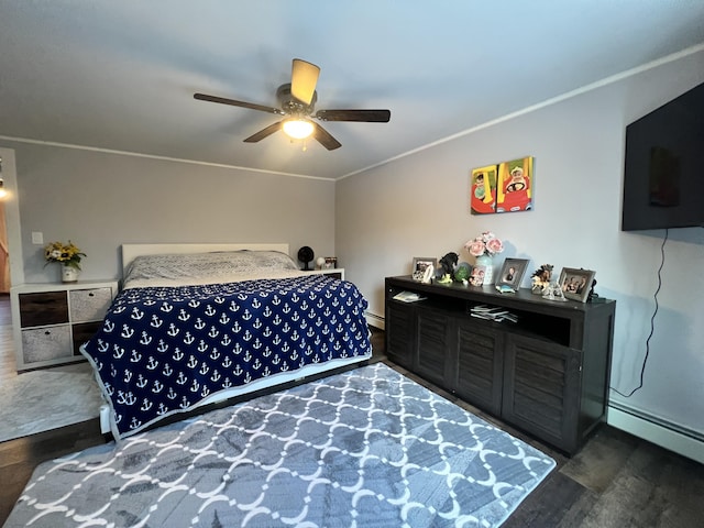 701 Stetson Rd, Exeter, ME 04435 - bedroom featuring wood finished floors, ceiling fan, and a baseboard radiator