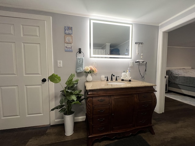 701 Stetson Rd, Exeter, ME 04435 - bathroom featuring vanity, connected bathroom, and crown molding