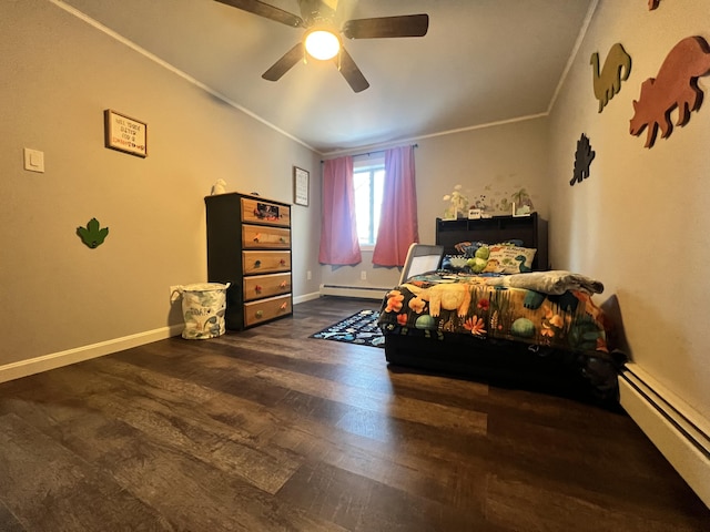701 Stetson Rd, Exeter, ME 04435 - bedroom featuring baseboard heating, crown molding, dark wood finished floors, and a ceiling fan
