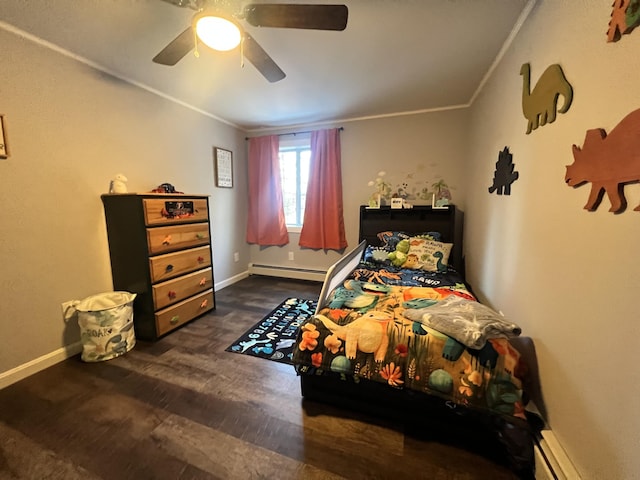 bedroom with a baseboard heating unit, dark hardwood / wood-style floors, ceiling fan, and crown molding