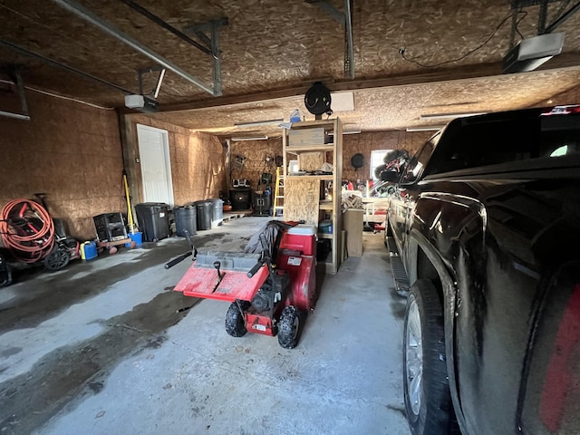 701 Stetson Rd, Exeter, ME 04435 - garage featuring a garage door opener
