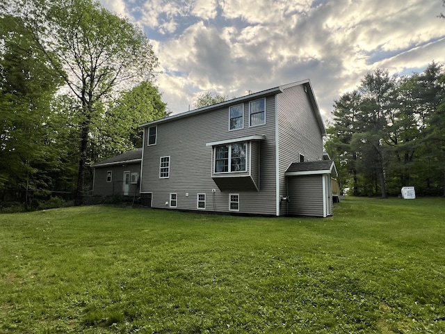 701 Stetson Rd, Exeter, ME 04435 - rear view of house with a lawn