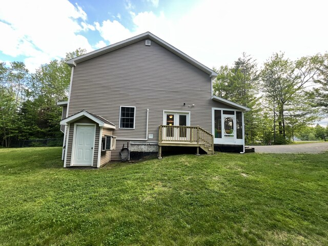 701 Stetson Rd, Exeter, ME 04435 - back of house with a yard and a sunroom