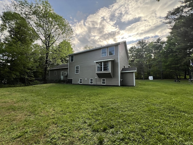 701 Stetson Rd, Exeter, ME 04435 - rear view of house with a lawn