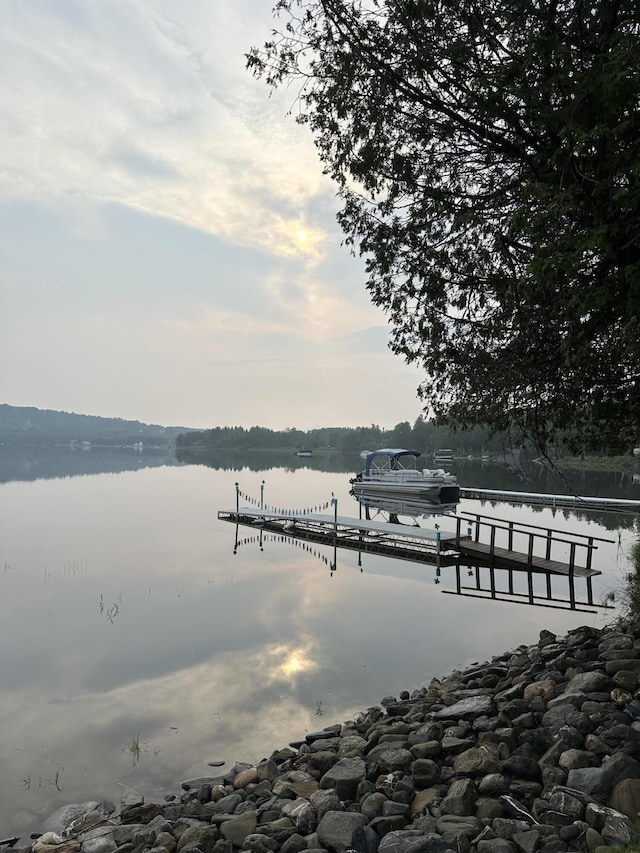 view of dock with a water view