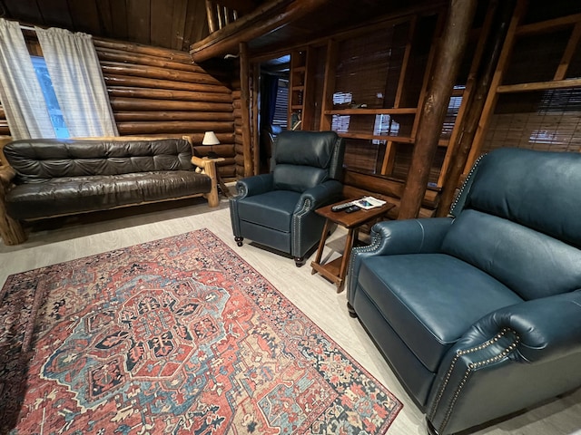 living room with light wood-type flooring and rustic walls