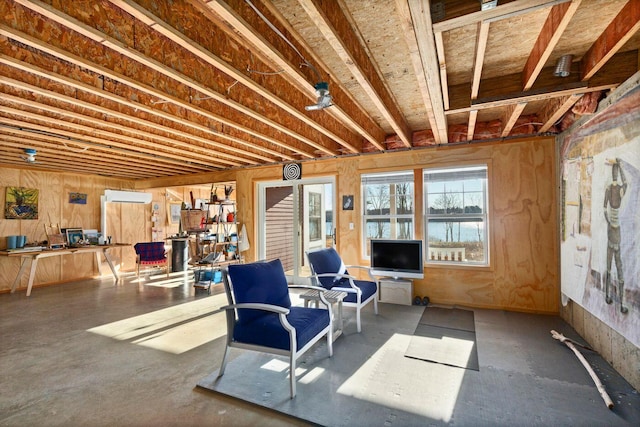 basement featuring a wall unit AC