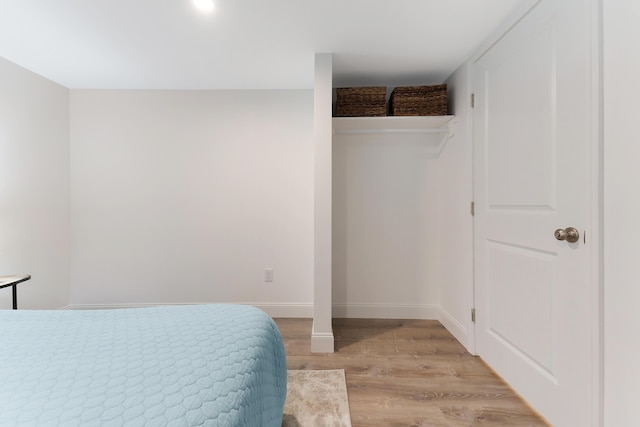 bedroom with light hardwood / wood-style flooring