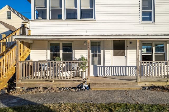 doorway to property featuring a porch